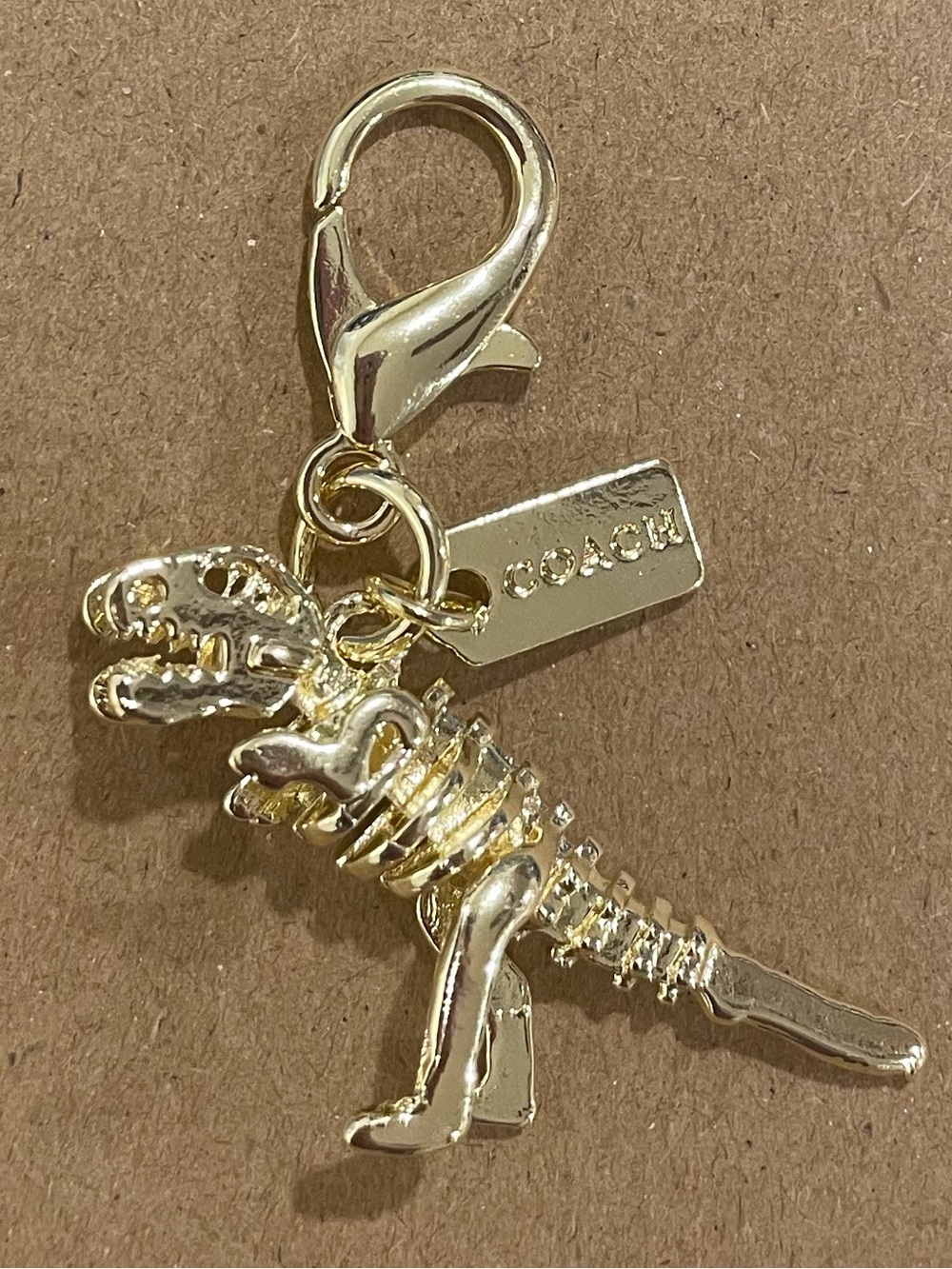 Coach Gold T-Rex Skeleton Charm with Lobster Clasp